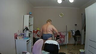 Mother-in-law cleans the bedroom bare
