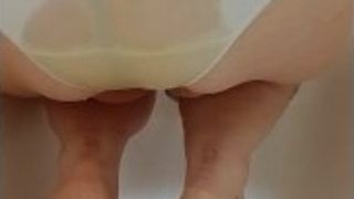 Ample cunt plus-size urinates in milky underpants