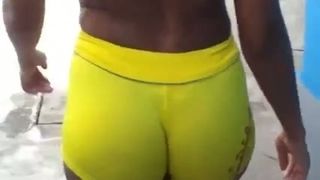 Breathtaking yellow tight shorts on the round ass of my milf babe