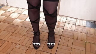 Sumptuous Basque stilettos and pantyhose and suspenders outdoors in the cold