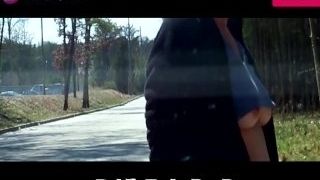Cougar Sheery bra-less Outdoor displaying UnderBoob dressed in a Blue flog Top smoking standing in the road